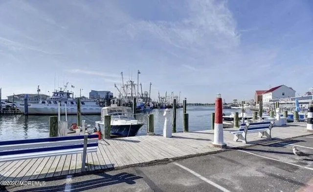 a view of a terrace with wooden floor and seating space