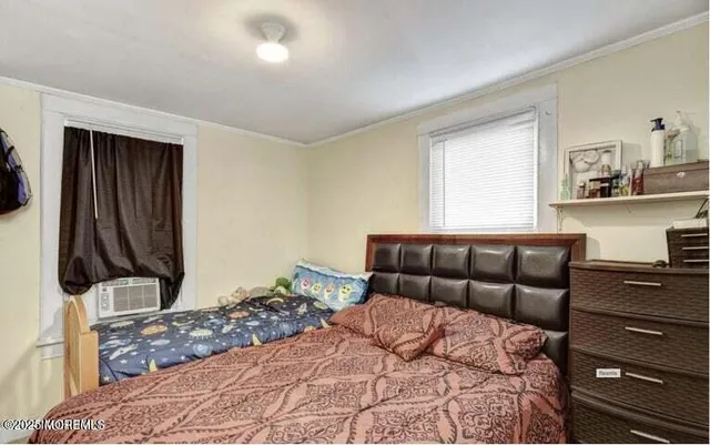 a bedroom with a bed and closet