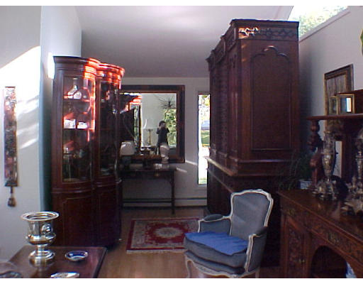293 Hartman Road Newton, MA 02459 - Photo 3 of 8 a living room with furniture and wooden floor