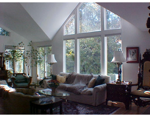 293 Hartman Road Newton, MA 02459 - Photo 4 of 8 a living room with furniture and large windows