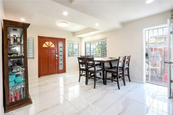 a view of a dining room with furniture