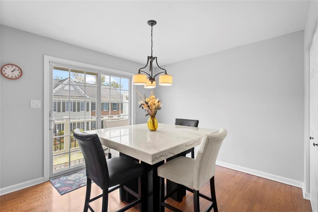 23 Castle View Drive McKees Rocks, PA 15136 - Photo 13 of 27 a dining room with furniture a chandelier and wooden floor