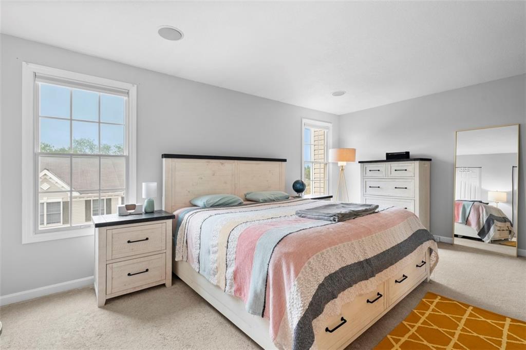 23 Castle View Drive McKees Rocks, PA 15136 - Photo 16 of 27 a bedroom with a bed and a large window