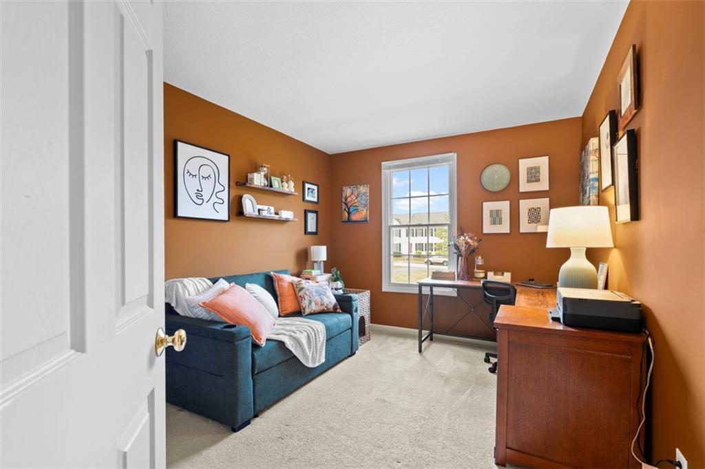 23 Castle View Drive McKees Rocks, PA 15136 - Photo 20 of 27 a living room with furniture and a floor to ceiling window