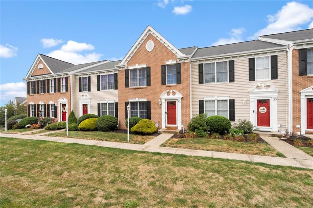 23 Castle View Drive McKees Rocks, PA 15136 - Photo 2 of 27 a view of house with yard and green space