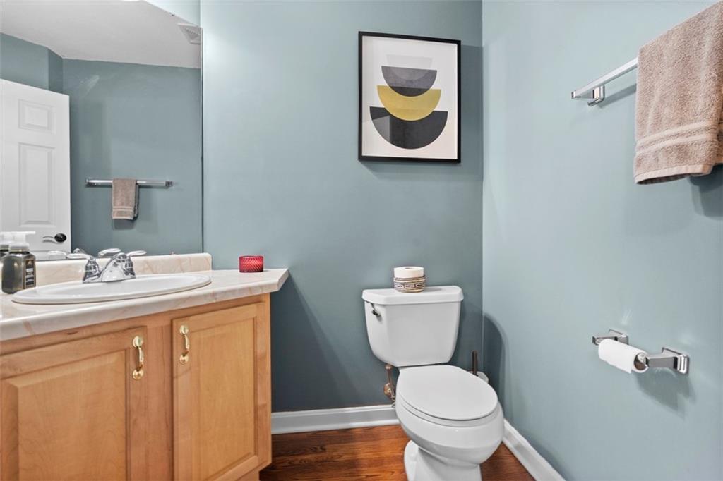 23 Castle View Drive McKees Rocks, PA 15136 - Photo 5 of 27 a bathroom with a toilet sink and mirror