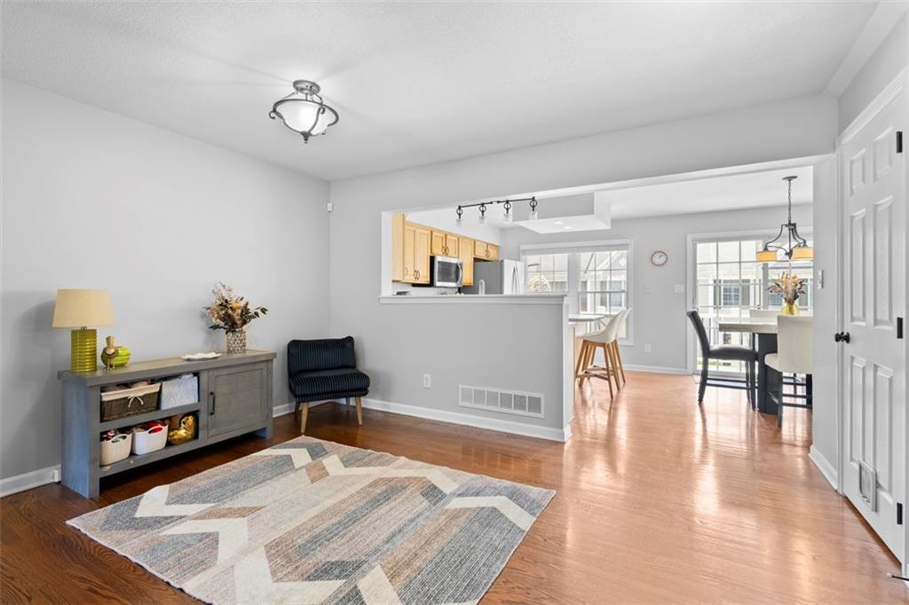 23 Castle View Drive McKees Rocks, PA 15136 - Photo 8 of 27 a living room with furniture and a wooden floor