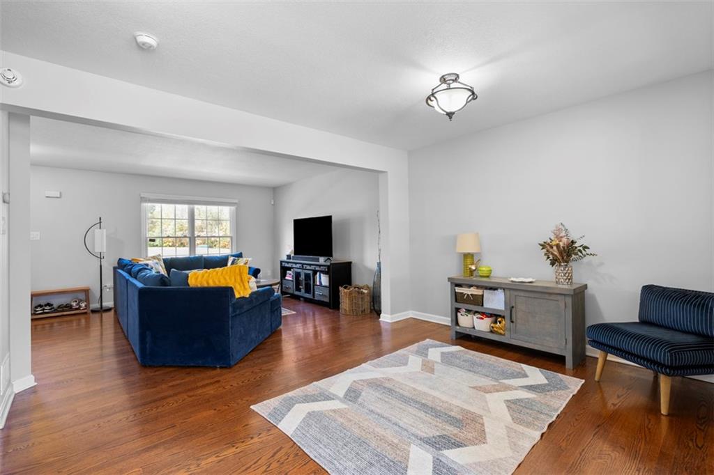 23 Castle View Drive McKees Rocks, PA 15136 - Photo 9 of 27 a living room with furniture and a flat screen tv