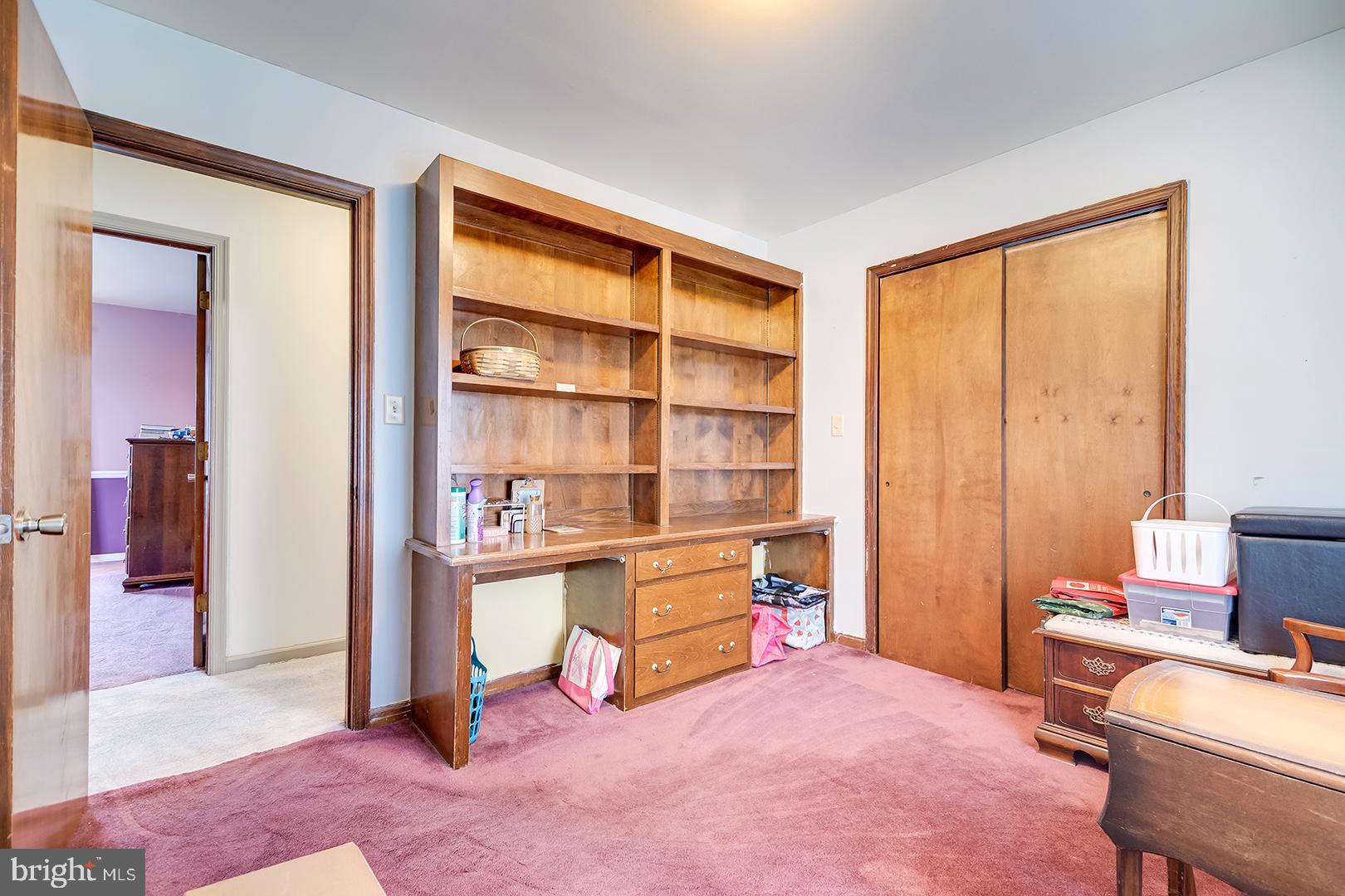 10046 Woodyard Road Greenwood, DE 19950 - Photo 18 of 45 a view of a workspace with furniture and a window
