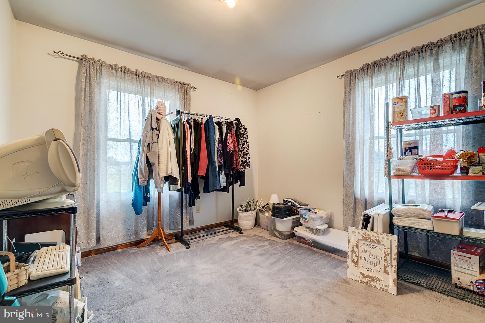 10046 Woodyard Road Greenwood, DE 19950 - Photo 19 of 45 a view of a room with gym equipment
