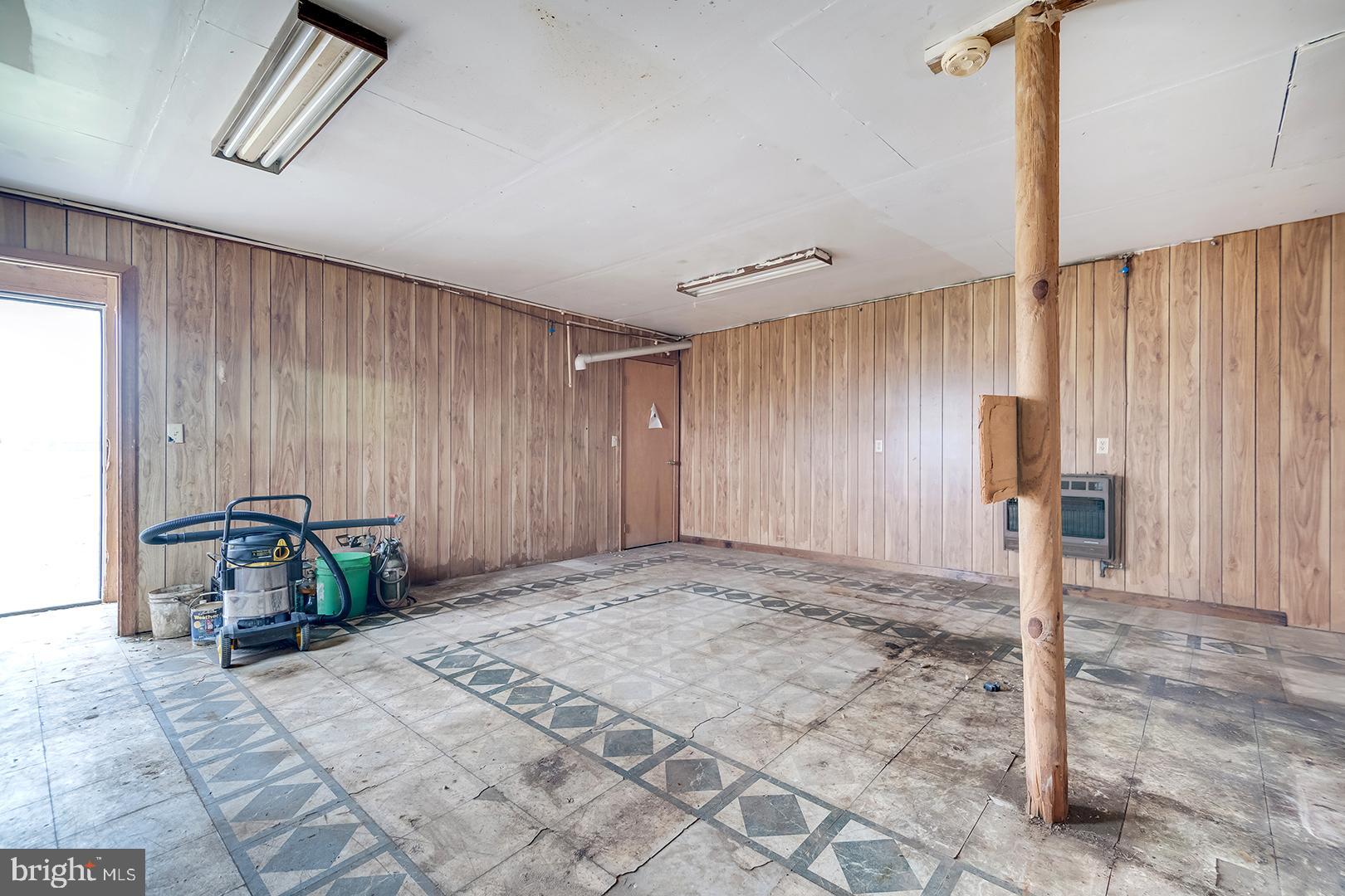 10046 Woodyard Road Greenwood, DE 19950 - Photo 31 of 45 a view of a hallway with a window