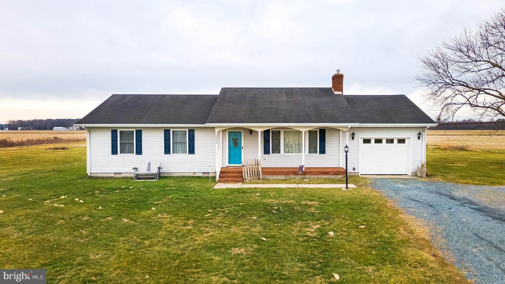 10046 Woodyard Road Greenwood, DE 19950 - Photo 34 of 45 a front view of a house with a yard