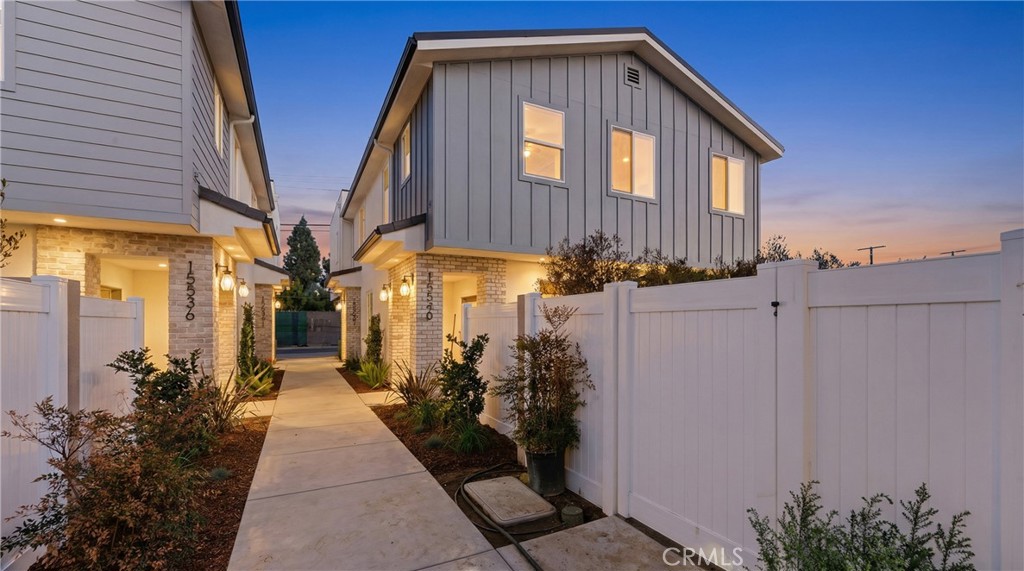 15540 Colorado Avenue Paramount, CA 90723 - Photo 1 of 63 a view of a house with a backyard