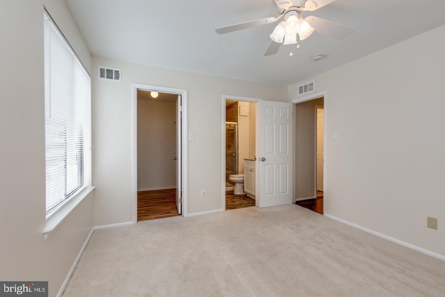 514 The Woods Cherry Hill, NJ 08003 - Photo 8 of 12 Primary bedroom w/ walk-in closet + en-suite bath