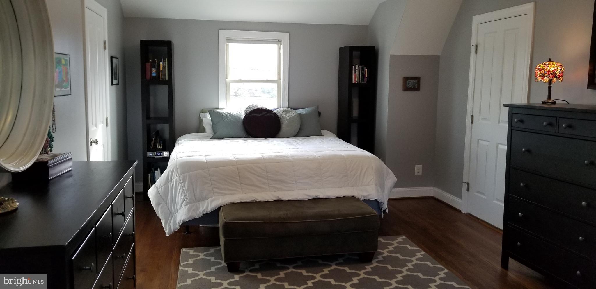 1709 Forest Glen Road Silver Spring, MD 20910 - Photo 13 of 61 a bedroom with a bed and wooden floor