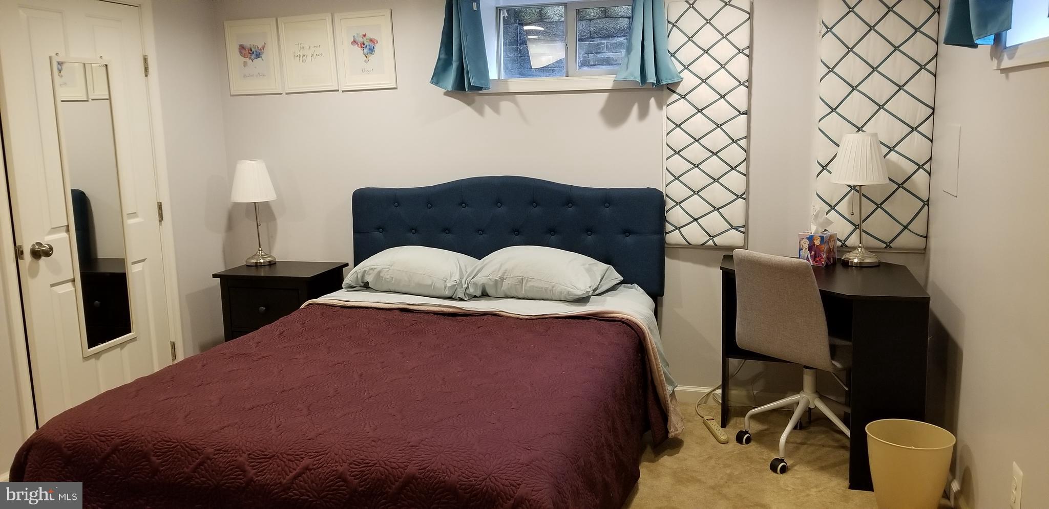 1709 Forest Glen Road Silver Spring, MD 20910 - Photo 26 of 61 a bedroom with a bed and a window