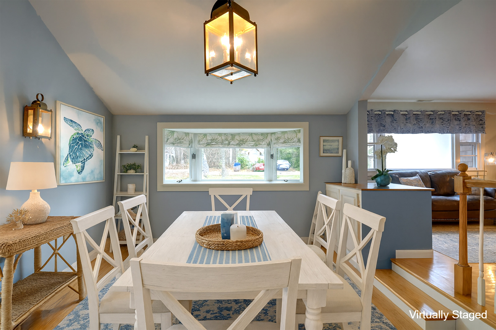 35 Mariners Way Edgartown, MA 02539 - Photo 11 of 32 a view of a dining room with furniture a couch and wooden floor