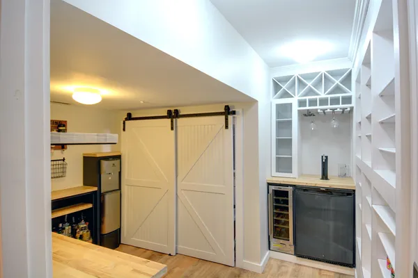 a bathroom with a shower and a sink