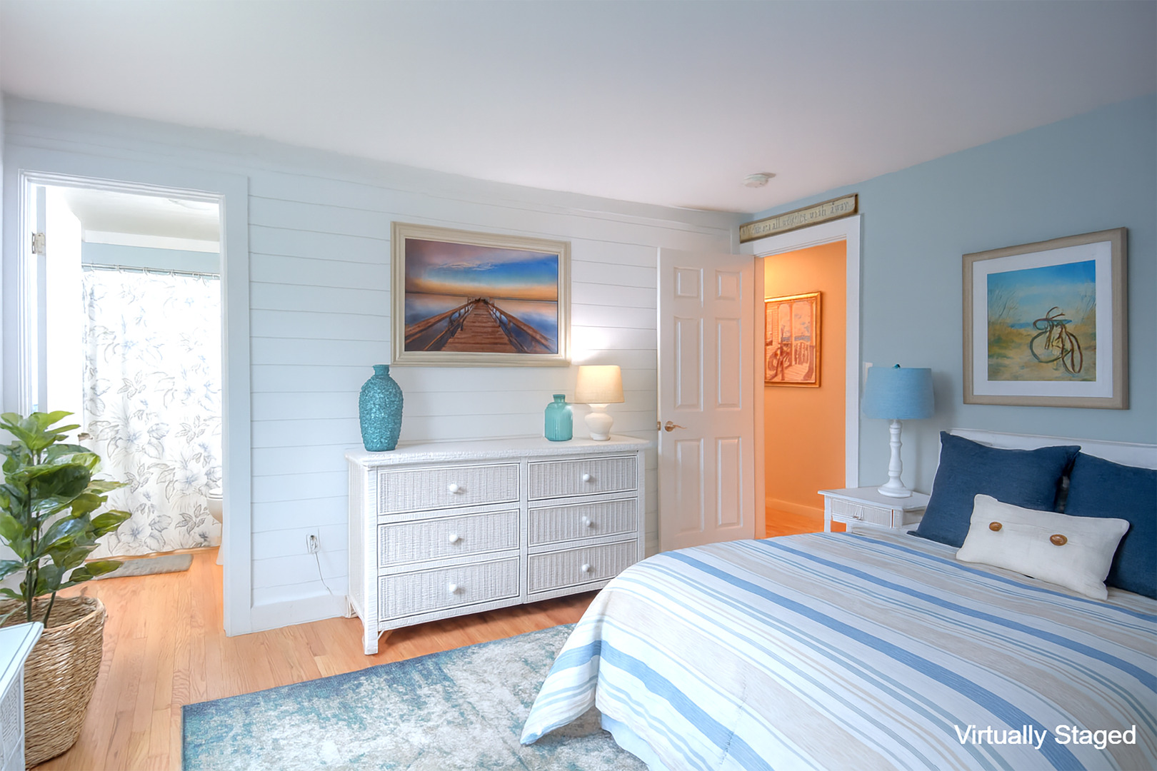 35 Mariners Way Edgartown, MA 02539 - Photo 21 of 32 a bedroom with a bed and a dresser in it