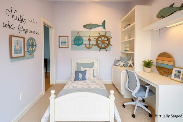 a bedroom with a bed and a table in it