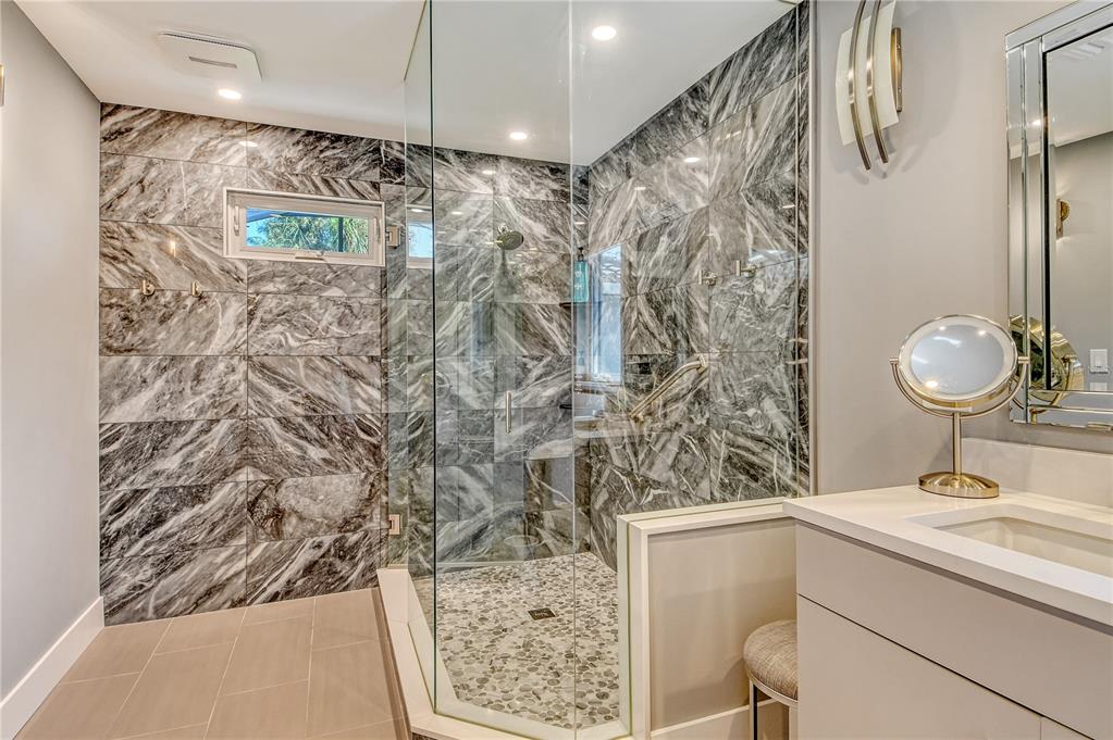 3210 Bayou Sound Longboat Key, FL 34228 - Photo 15 of 58 a bathroom with a shower and a sink