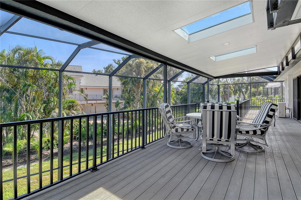 3210 Bayou Sound Longboat Key, FL 34228 - Photo 31 of 58 a view of a balcony with chairs