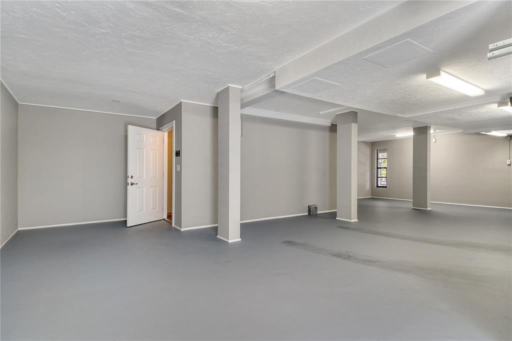 3210 Bayou Sound Longboat Key, FL 34228 - Photo 40 of 58 an empty room with closet and a fireplace