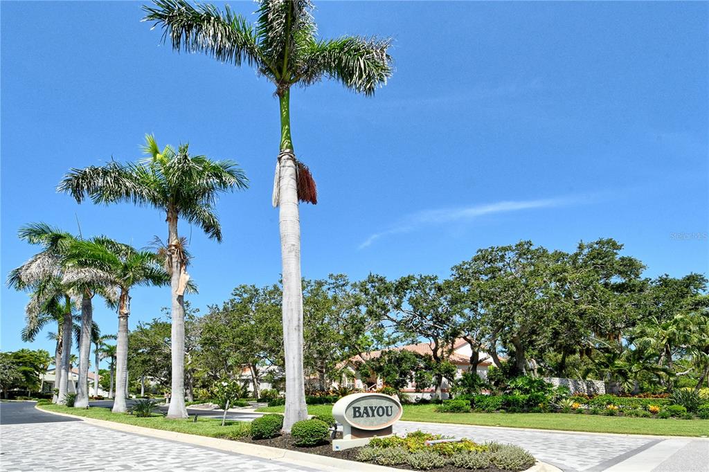 3210 Bayou Sound Longboat Key, FL 34228 - Photo 43 of 58 a view of a yard with a tree
