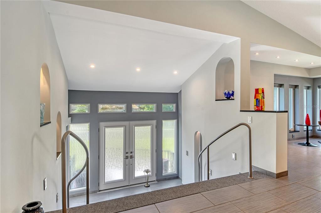 3210 Bayou Sound Longboat Key, FL 34228 - Photo 5 of 58 a view of an entryway with wooden floor