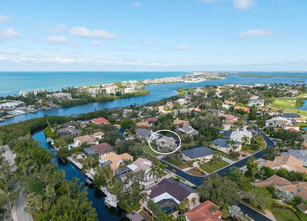 3210 Bayou Sound Longboat Key, FL 34228 - Photo 57 of 58 an aerial view of a residential houses with outdoor space and swimming pool