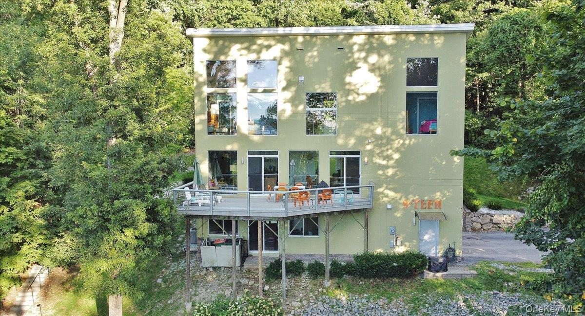 19 Melzingah Reservoir Road Beacon, NY 12508 - Photo 1 of 34 a view of kitchen with a table and chairs