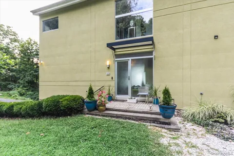 a front view of a house having yard
