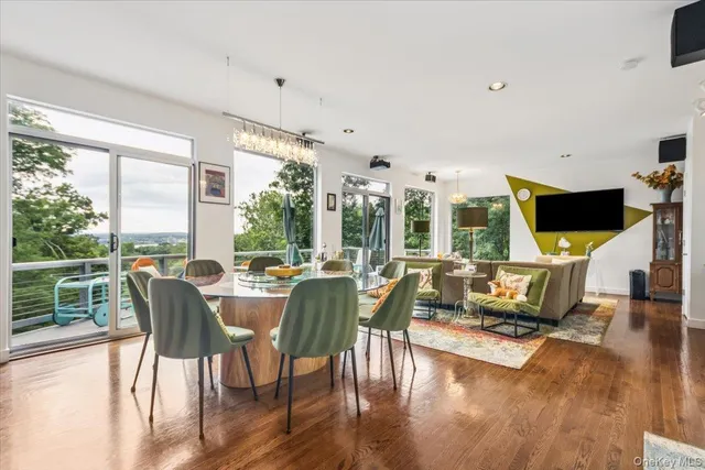 a living room with furniture fireplace and flat screen tv