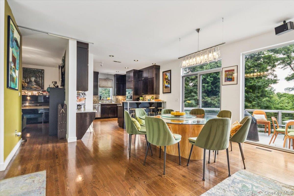 19 Melzingah Reservoir Road Beacon, NY 12508 - Photo 24 of 34 a view of a dining room with furniture window and wooden floor
