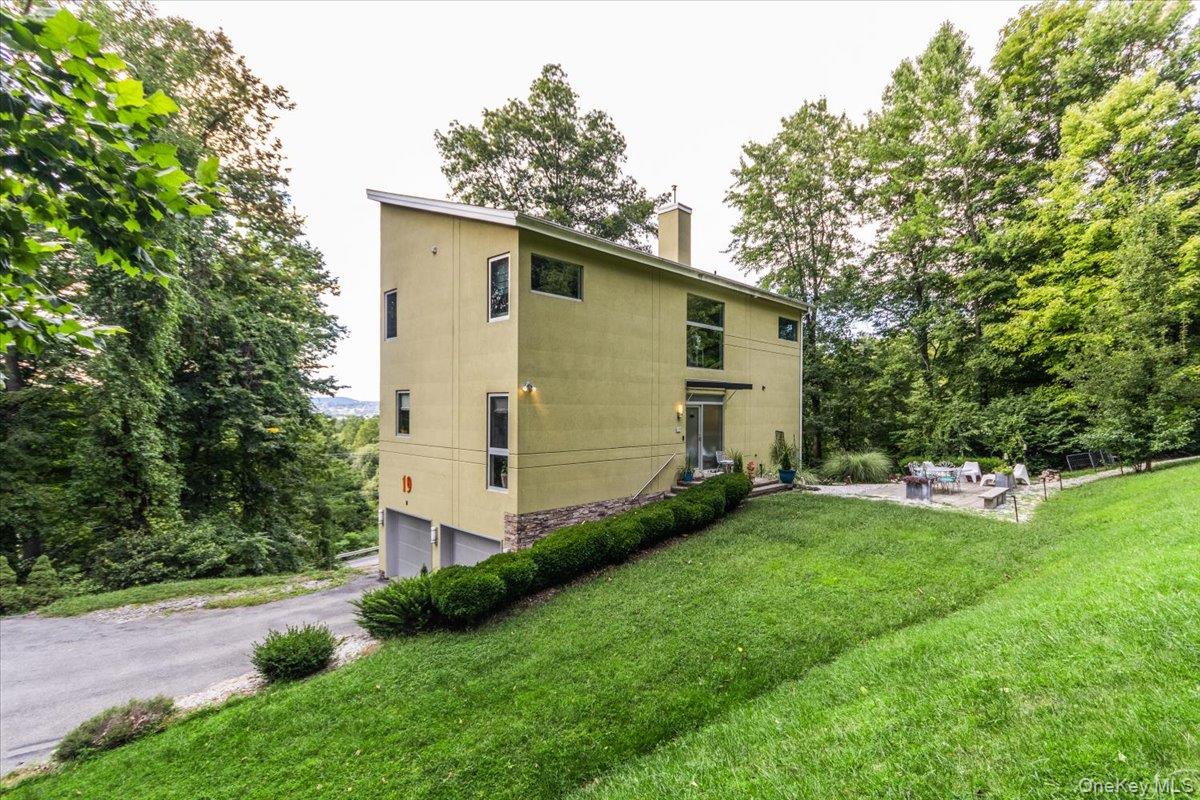 19 Melzingah Reservoir Road Beacon, NY 12508 - Photo 27 of 34 a view of backyard with a barn and a large cactus tree