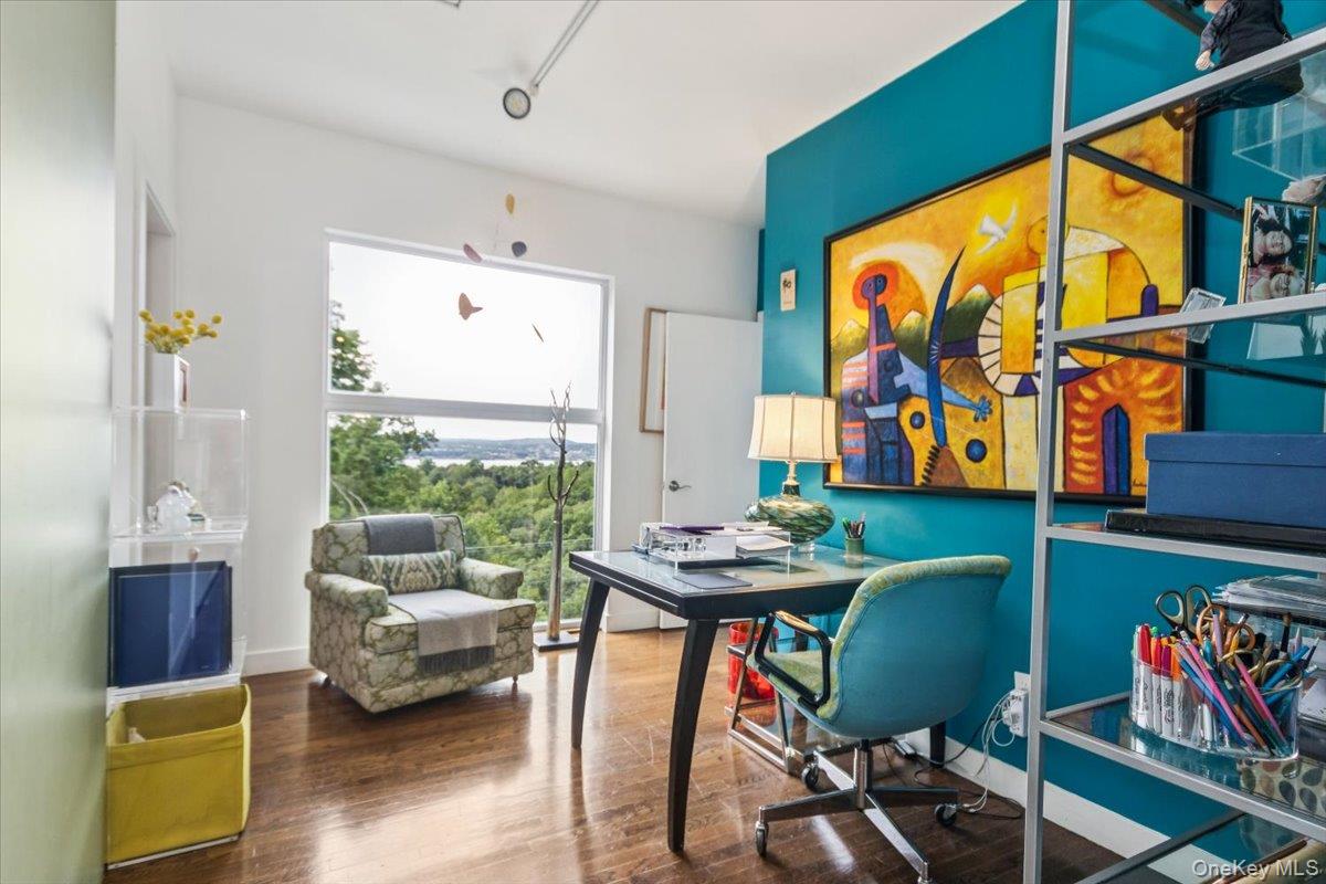 19 Melzingah Reservoir Road Beacon, NY 12508 - Photo 8 of 34 a living room with furniture a rug and a window