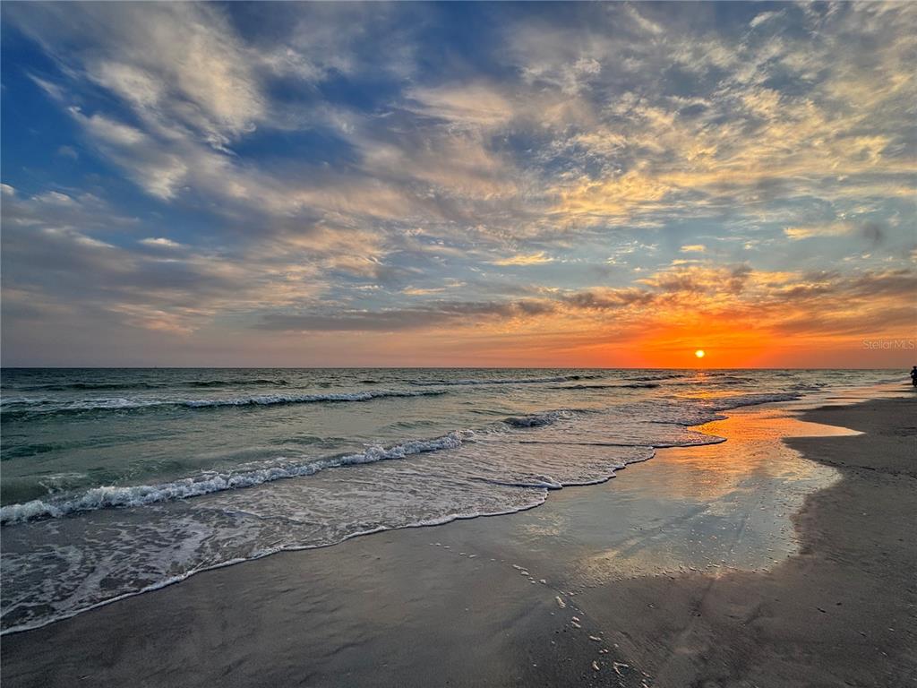 5476 Swift Road, Unit 19 Sarasota, FL 34231 - Photo 33 of 34 a view of an ocean and beach