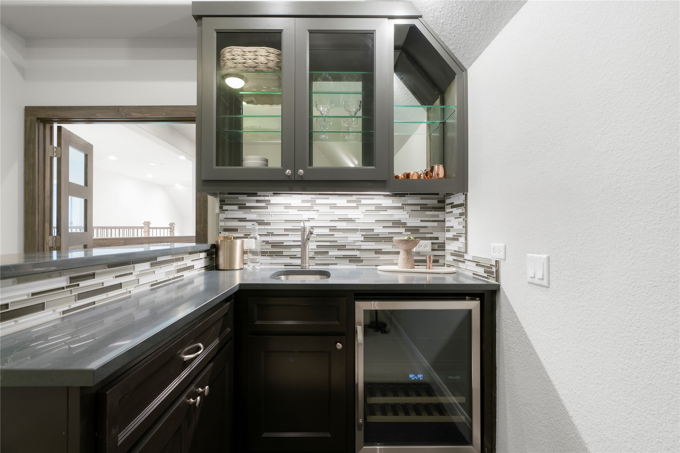 2033 Portobello Road Leander, TX 78641 - Photo 27 of 39 The impressive wet bar is perfect for entertaining or enjoying family movie nights.