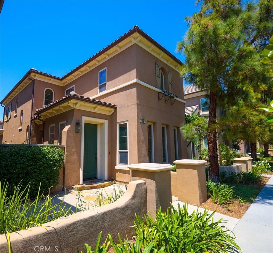 163 Rhapsody Irvine, CA 92620 - Photo 1 of 1 a front view of a house with garden