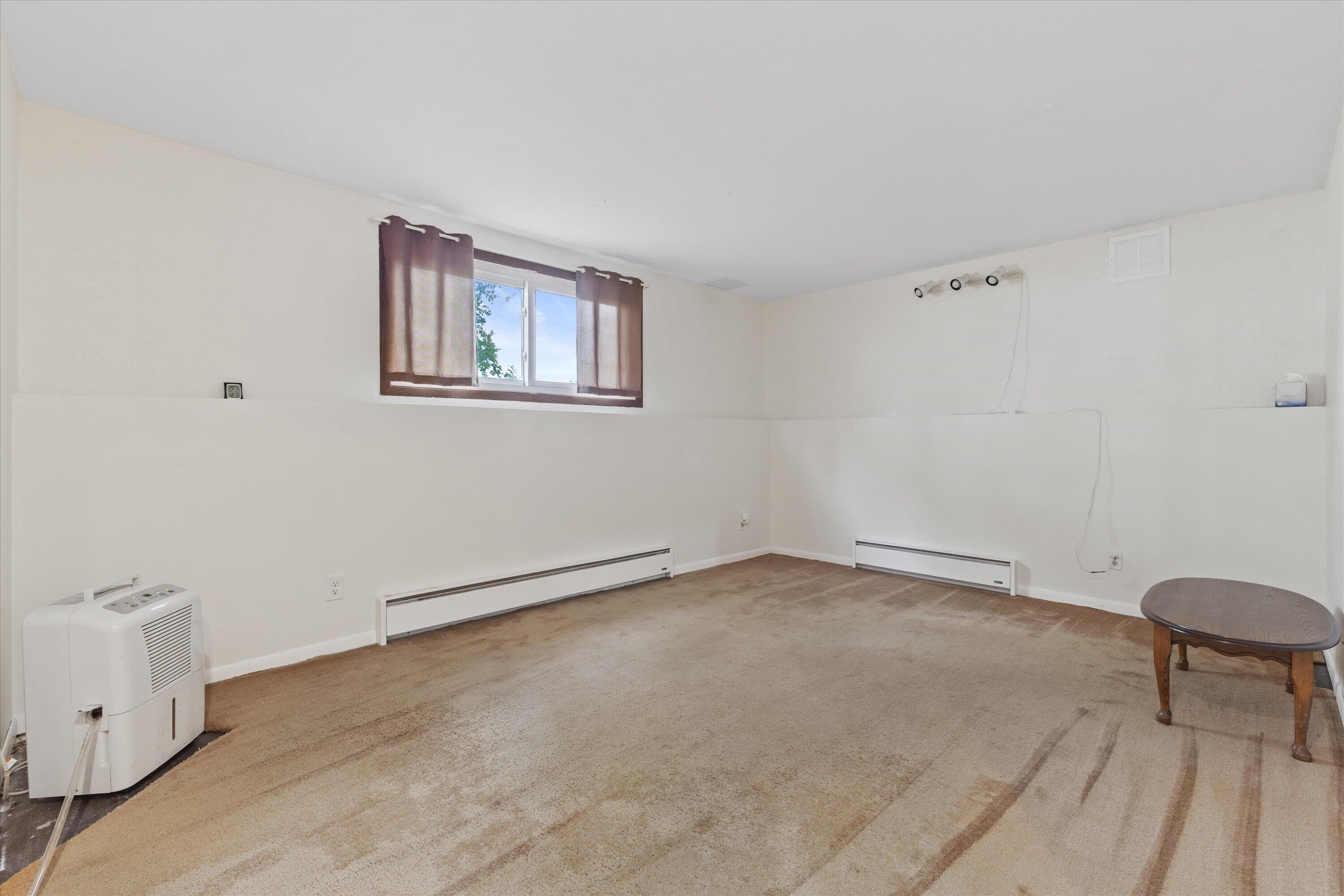 115 Conrad Court Mukwonago, WI 53149 - Photo 17 of 29 Rec Room