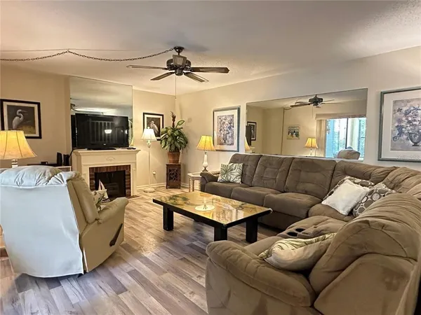 a kitchen with a sink cabinets and window