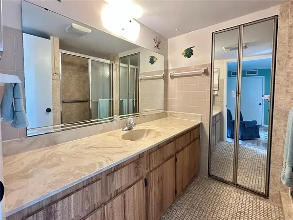 a bathroom with a shower and a toilet