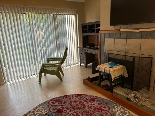 a room with table and chairs