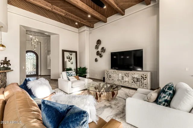 a bathroom with a granite countertop sink mirror and bathtub