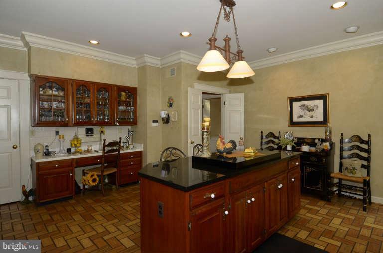 10531 Wickens Road Vienna, VA 22181 - Photo 13 of 30 Spacious Kitchen with Work Island & Seating