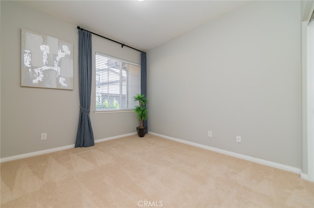 54 Shadowplay Irvine, CA 92620 - Photo 20 of 35 a view of an empty room with a window