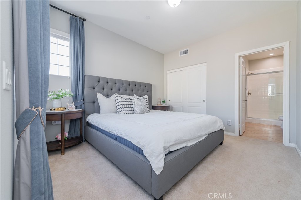 54 Shadowplay Irvine, CA 92620 - Photo 31 of 35 a bedroom with a bed and a window