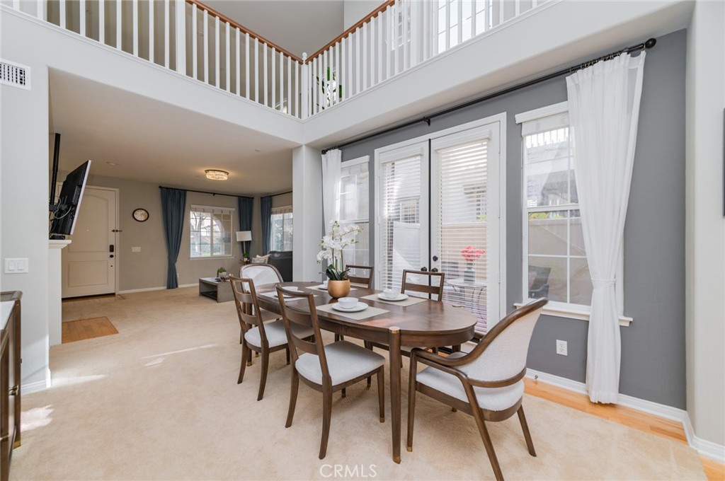 54 Shadowplay Irvine, CA 92620 - Photo 10 of 35 a dining room with furniture and window