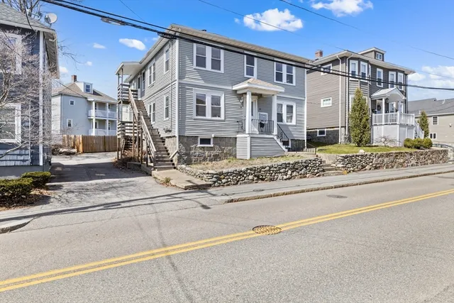 a front view of a building with street