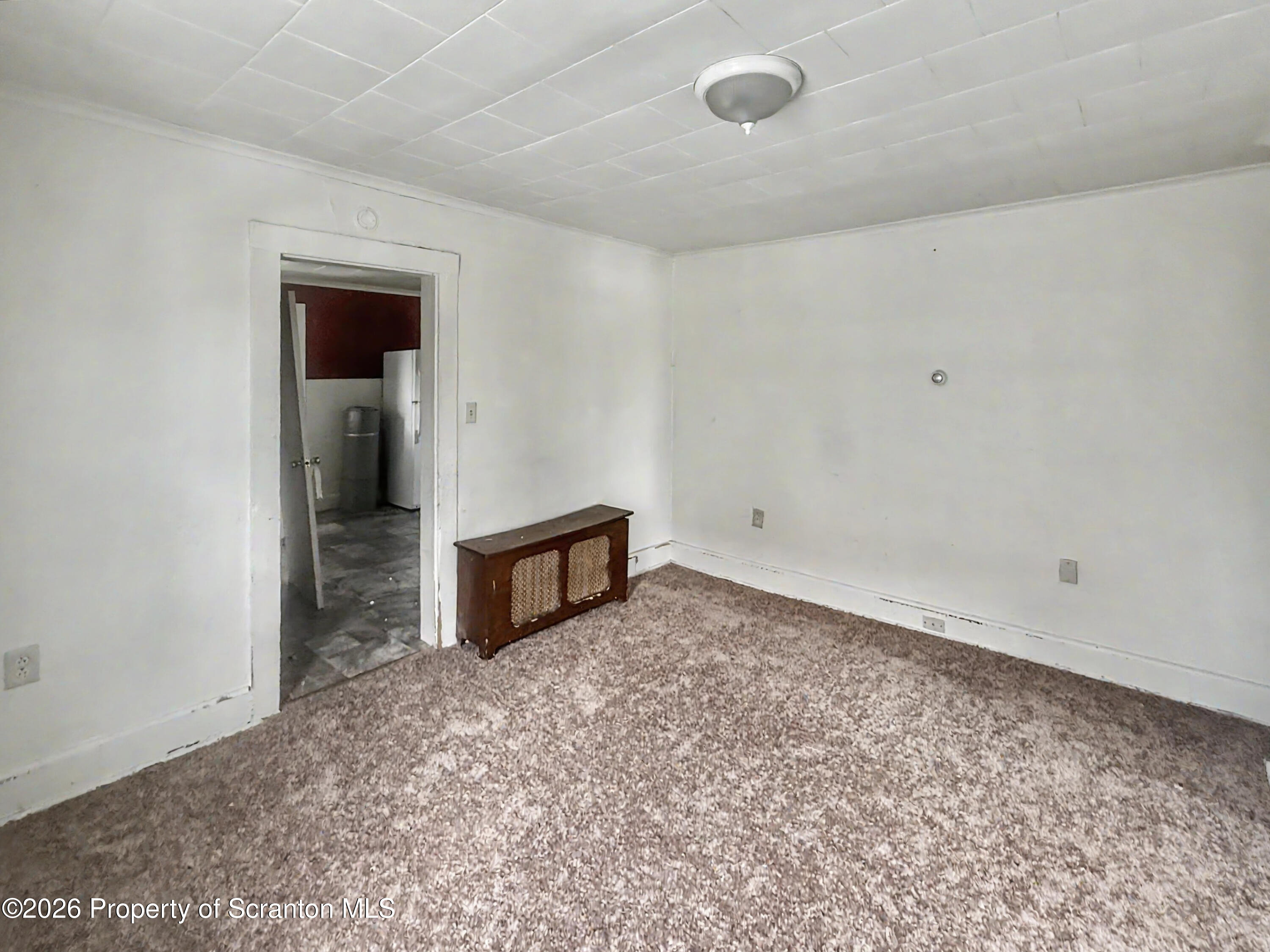 1315 Farr Street, Unit 2 Scranton, PA 18504 - Photo 2 of 7 wooden floor in an empty room